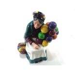 A Royal Doulton figure, The Old Balloon Seller, HN1315.