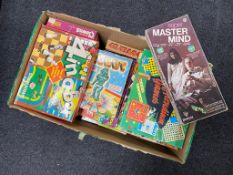 A box containing vintage games to include Mastermind, Games Compendiums, Magic Robot etc.