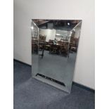 An all glass framed mirror