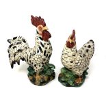 Two old French pottery figures modelled as a hen and cockerel, height 32 cm.