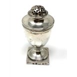 A Georgian silver pepper pot by Robert and Samuel Hennell, London 1803.