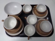 A tray containing a 20 piece Denby stoneware tea service.