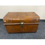 An early 20th century tin trunk