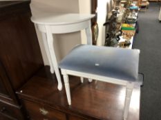 A painted D-shaped hall table together with a painted dressing table stool with dralon seat.