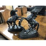 A pair of antique Spelter figures of rearing horses.