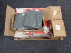 A box of three boxes of grey mailing bags together with two further boxes of A4 white envelopes