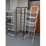 A metal tray trolley together with two shop display stands.