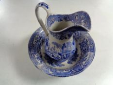 An antique blue and white wash jug with basin.