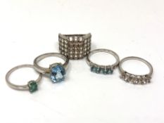 Five silver gem set dress rings.
