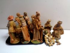 A tray containing an 11 piece 20th century plastic nativity set (as found).