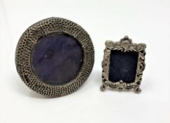 Two miniature silver photo frames