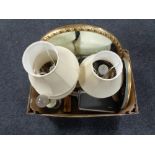 A box containing oils on panels, still life, oval framed bevel edged mirror, table lamps,