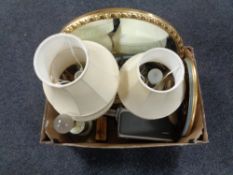 A box containing oils on panels, still life, oval framed bevel edged mirror, table lamps,