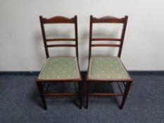 A pair of Edwardian inlaid mahogany bedroom chairs