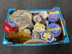 A box containing Ringtons china to include commemorative mugs and tea caddies,