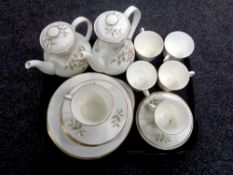 A tray containing 27 pieces of Royal Doulton Yorkshire Rose bone tea china.