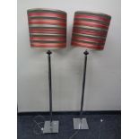 A good quality pair of contemporary chrome standard lamps with shades.