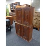 Two antique oak double door wall cabinets.