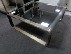 A contemporary metal framed coffee table.