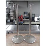 Two stainless steel bollards.