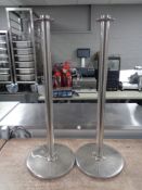 Two stainless steel bollards.