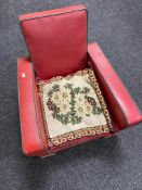 An early 20th century red vinyl upholstered child's armchair