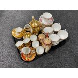 A tray containing three tea services to include Colclough, Bavarian and Japanese.