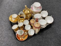 A tray containing three tea services to include Colclough, Bavarian and Japanese.