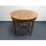 A 19th century circular mahogany occasional table with satinwood inlay