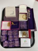 A tray containing a quantity of boxed costume jewellery to include bracelets, necklaces,