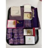 A tray containing a quantity of boxed costume jewellery to include bracelets, necklaces,