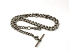 An antique silver Albert chain 55g.