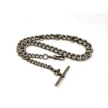 An antique silver Albert chain 55g.