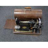 A vintage Singer cased sewing machine.