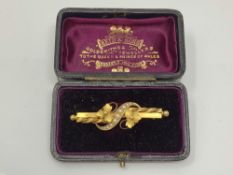 An antique gold pearl brooch, in Reid & Sons box CONDITION REPORT: 3.7g.