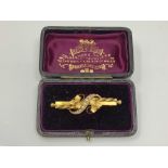 An antique gold pearl brooch, in Reid & Sons box CONDITION REPORT: 3.7g.