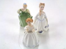 Three Royal Doulton figures, Fair Maiden HN2211, Catherine HN3044 and Moonlight Rose HN3483.