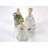 Three Royal Doulton figures, Fair Maiden HN2211, Catherine HN3044 and Moonlight Rose HN3483.