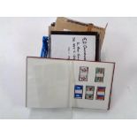 Three albums of stamps - GB Commemoratives, mint gutter pairs 1924 - 1982.