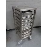 A stainless steel commercial Bain Marie trolley with Bain Marie trays, height 104 cm.