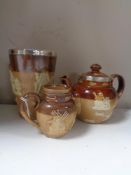 A 19th century Royal Doulton stoneware beaker with silver rim together with a Royal Doulton silver