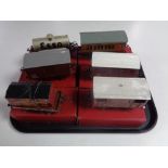 A tray containing six assorted Hornby break vans, cattle trucks, petrol tankers etc (boxed).