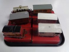 A tray containing six assorted Hornby break vans, cattle trucks, petrol tankers etc (boxed).