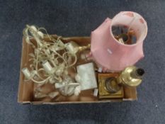 A box containing three brass table lamps,