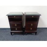 A pair of Stag Minstrel two drawer bedside stands with slides