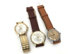 Three vintage gent's wristwatches comprising Oris, Ebel, and Damas.