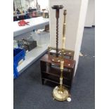 A set of open bookshelves together with a gilt framed mirror,