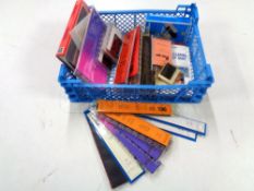 A crate of Prinz strips, Stanley Gibbons albums etc.