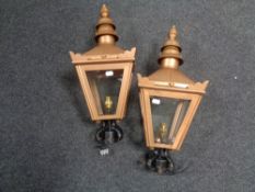 A pair of reproduction lanterns, height 52 cm.