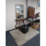 A shaped hall table together with a gilt framed bevel edged mirror,